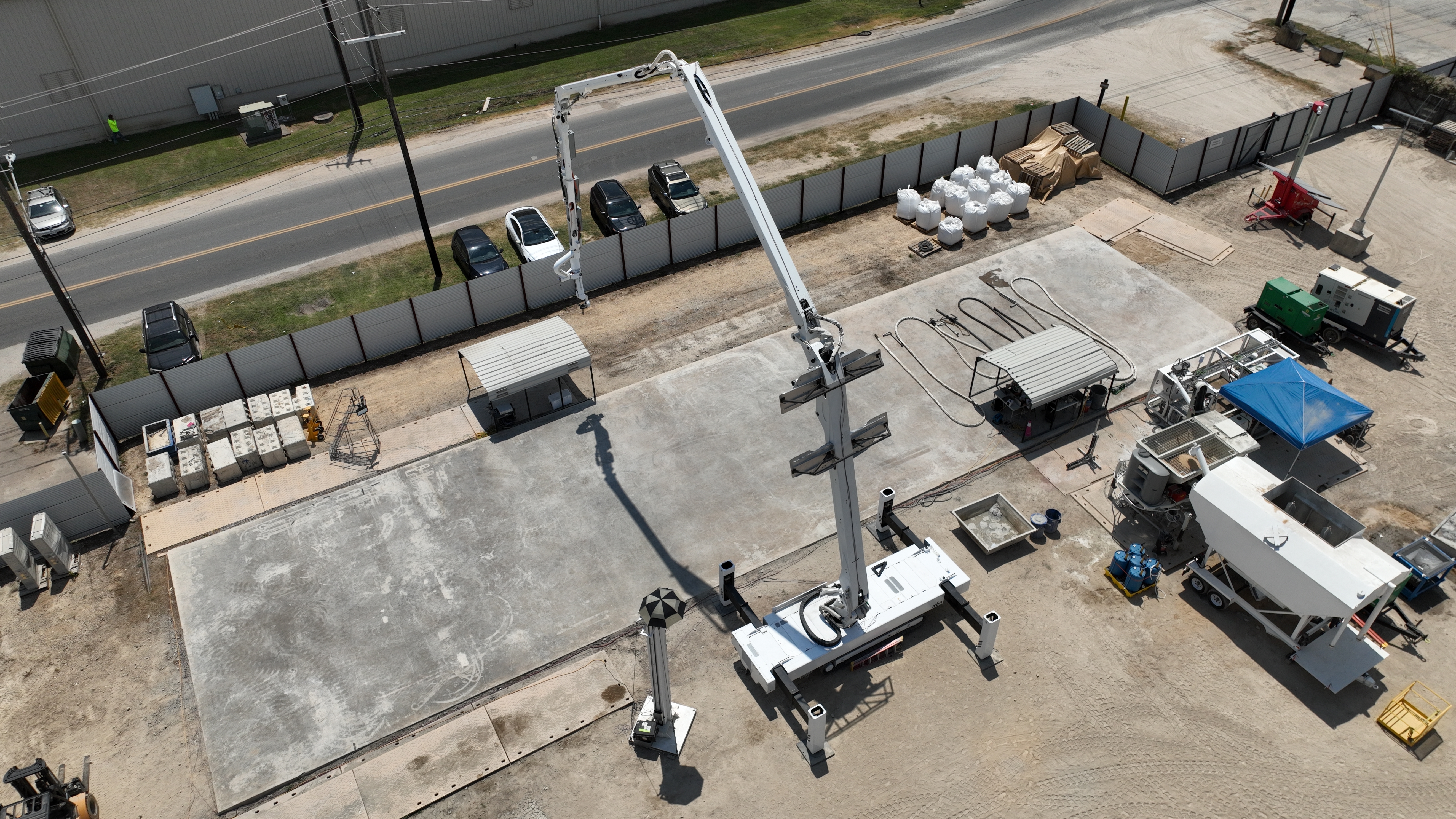ICON next-generation multi-story robotic gantry printer at an R&D testing facility